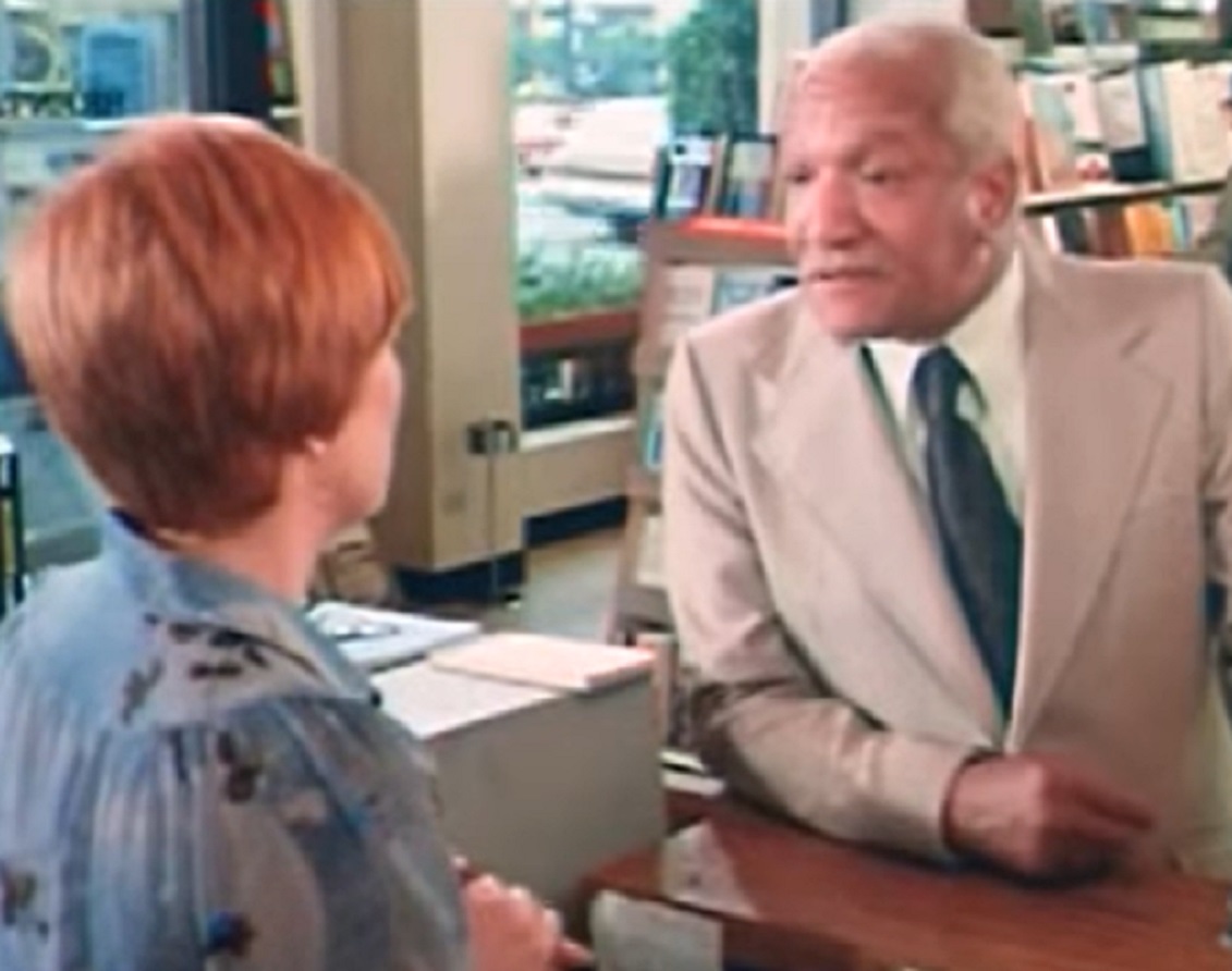 Screenshot of Redd Foxx talking with woman - from Norman... Is That You? (1976)
