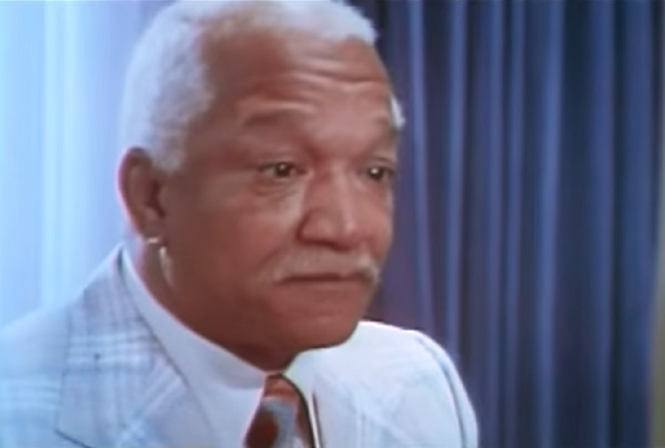 Screenshot of Redd Foxx looking at side - from Norman... Is That You? (1976)