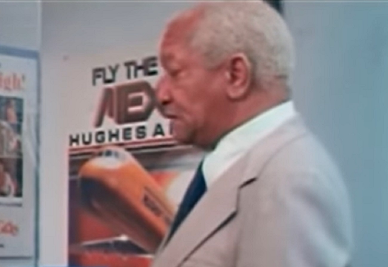 Screenshot of Redd Foxx in light suit looking sad - from Norman... Is That You? (1976)