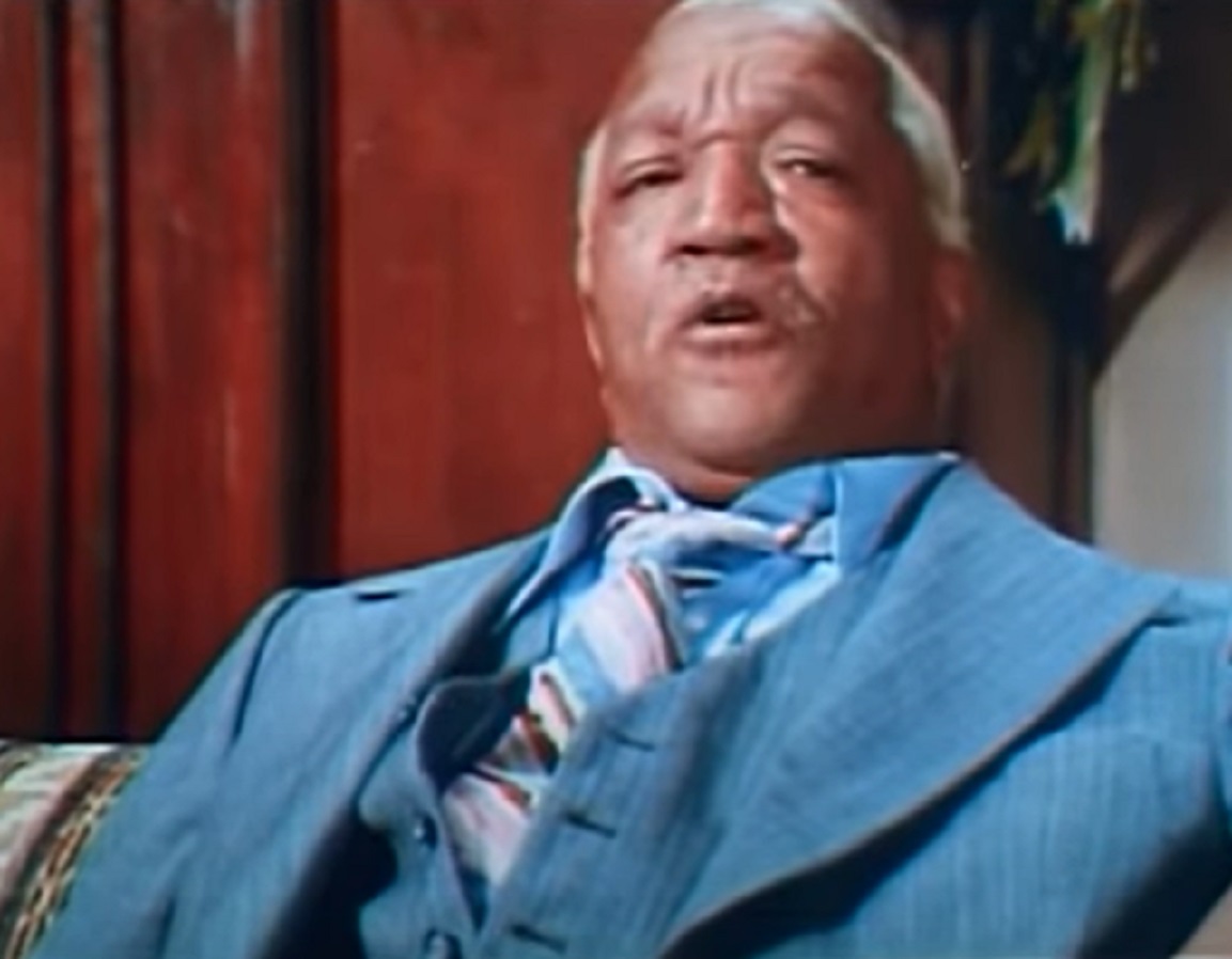 Screenshot of Redd Foxx wearing blue suit - from Norman ... Is That You (1976)