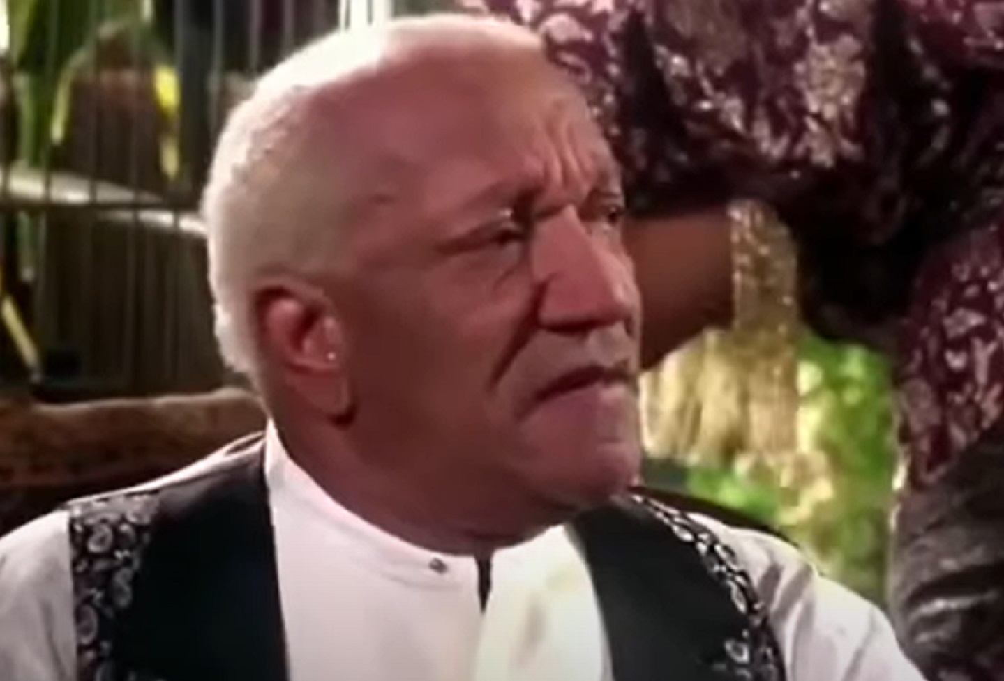 Screenshot of Redd Foxx looking surprised at side - from Harlem Nights (1989)