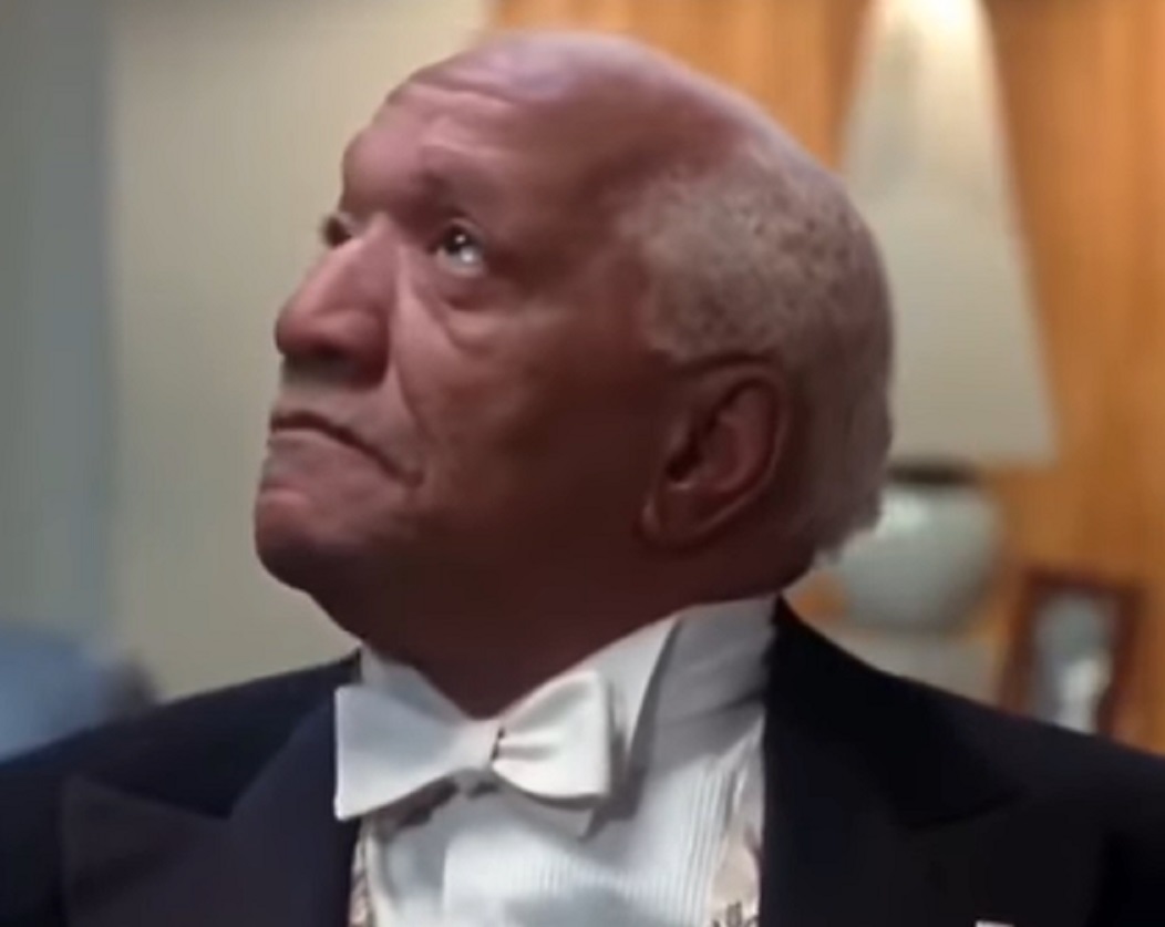 Screenshot of Redd Foxx  in suit ,looking at side - from Harlem Nights (1989)