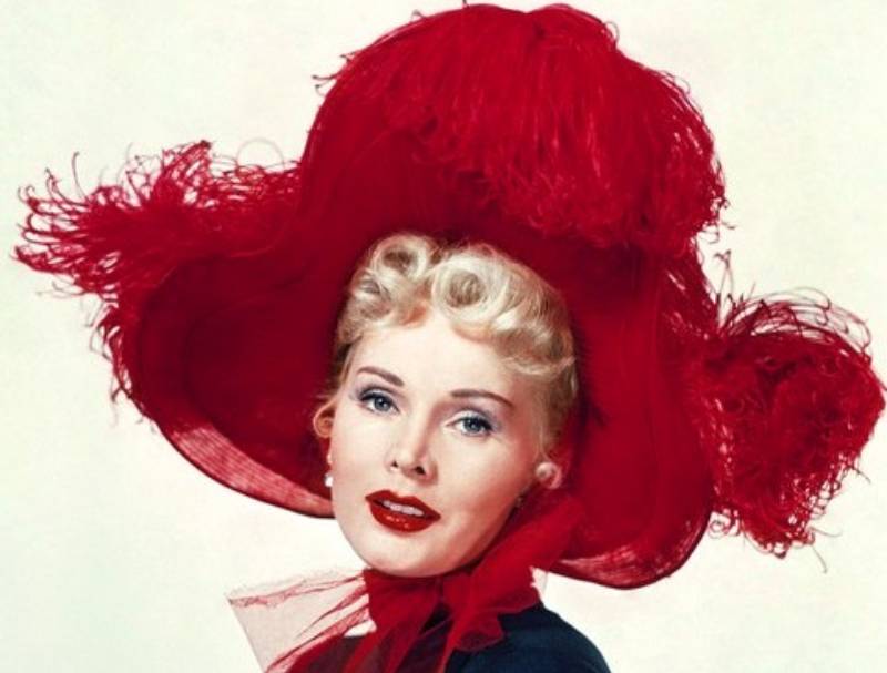 Zsa Zsa Gabor wearing big red hat