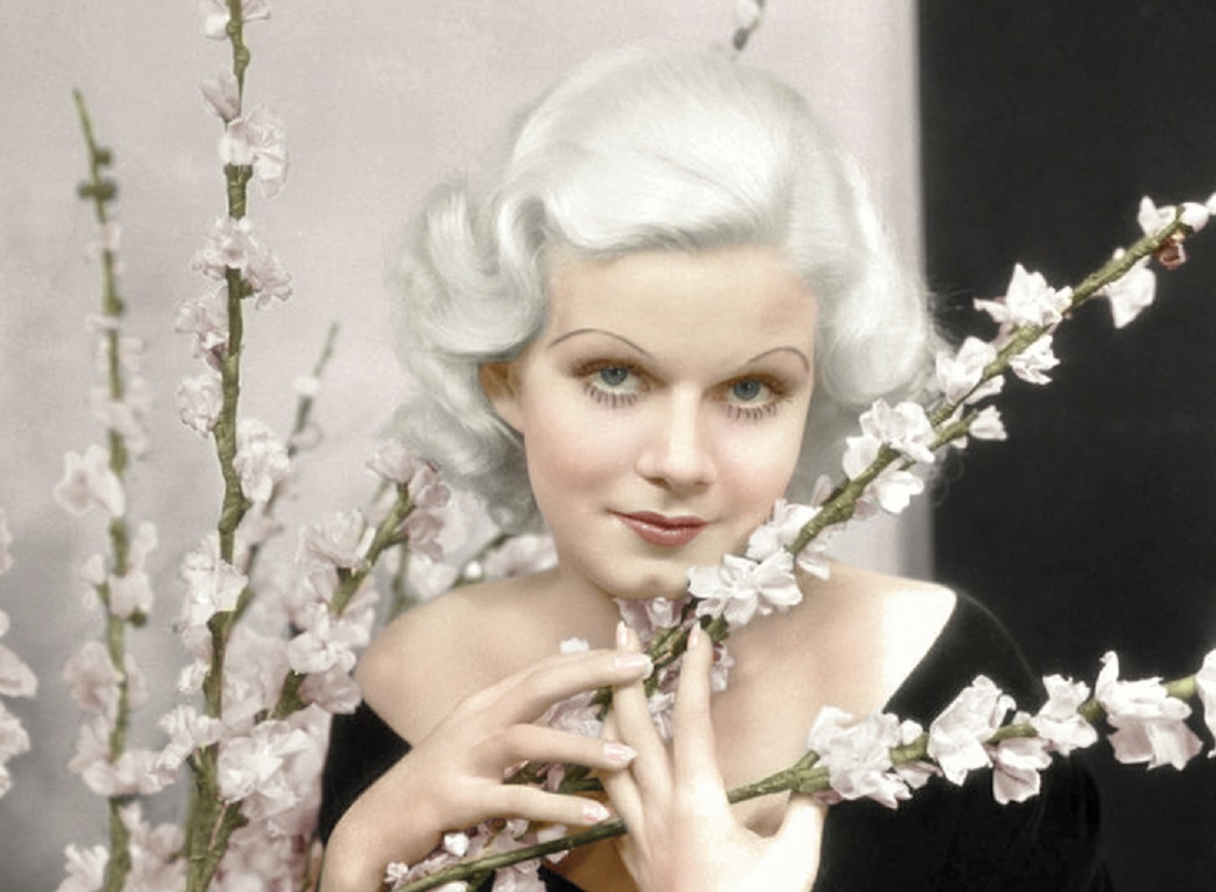 Portrait of Jean Harlow looking at camera.