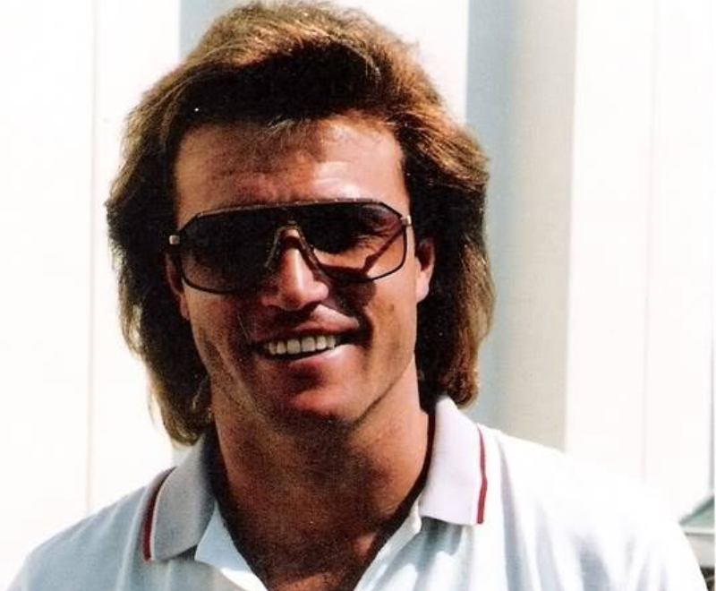 Andy Gibb in 1987 in white shirt