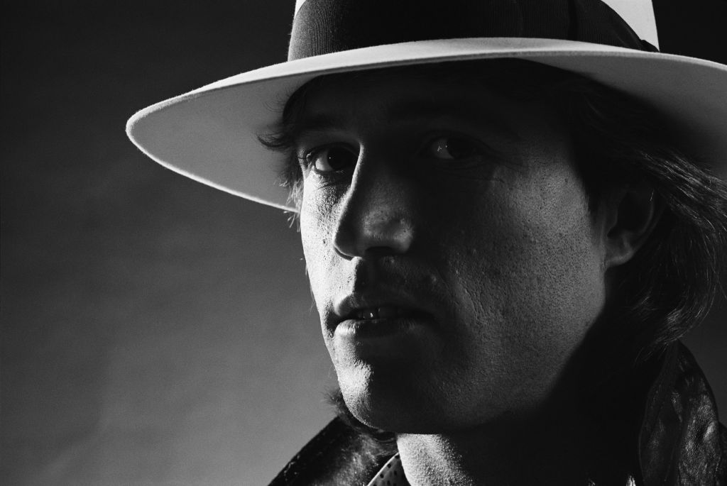 singer Andy Gibb wearing a hat