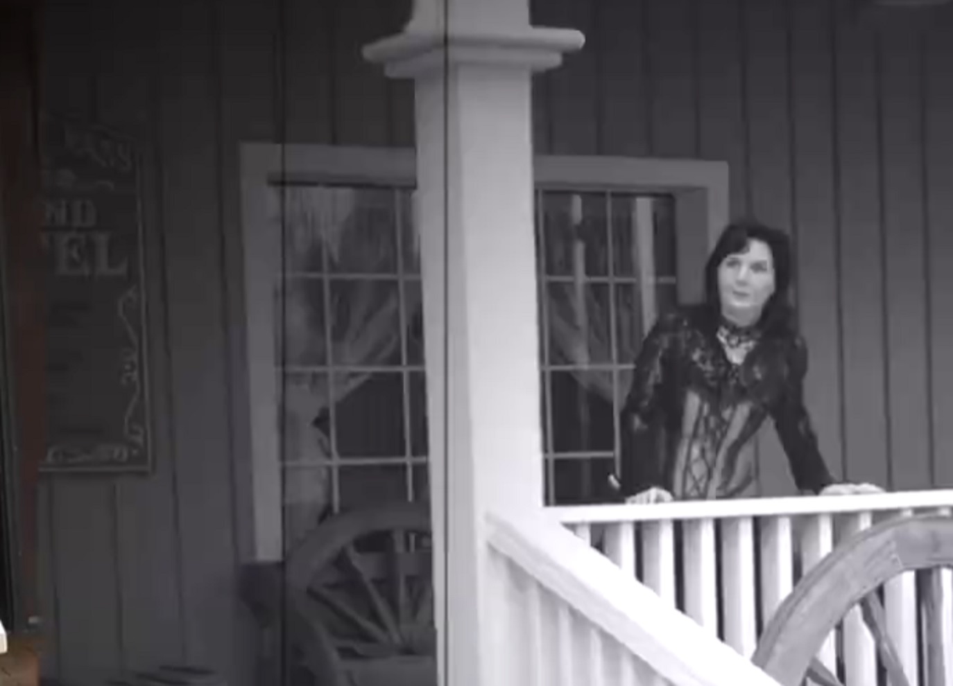 Screenshot of Big Nose Kate (Kate Horony) peeking from the porch - from One Day Only (2018/19)