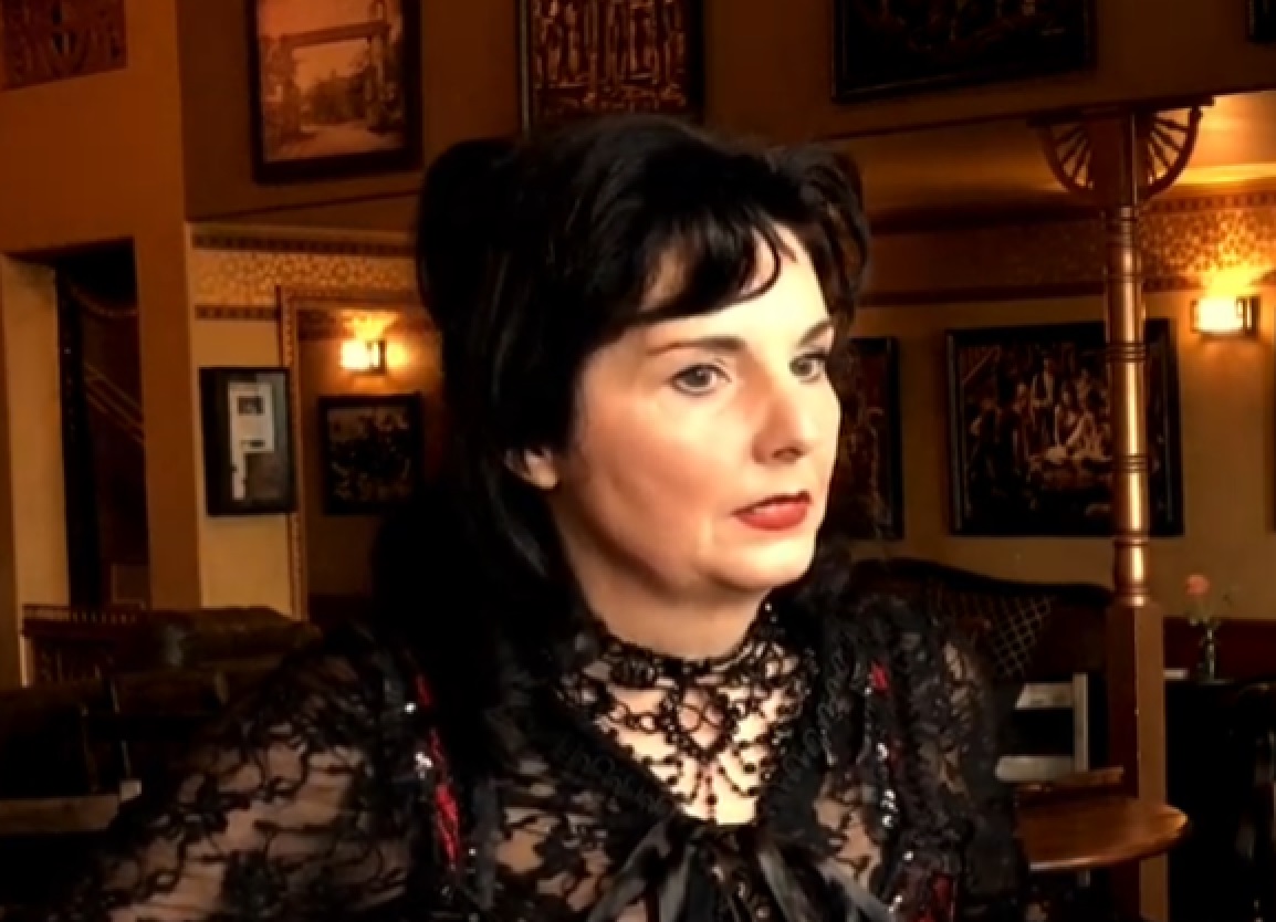 Screenshot of Big Nose Kate looking at side - from One Day Only (2018/19)