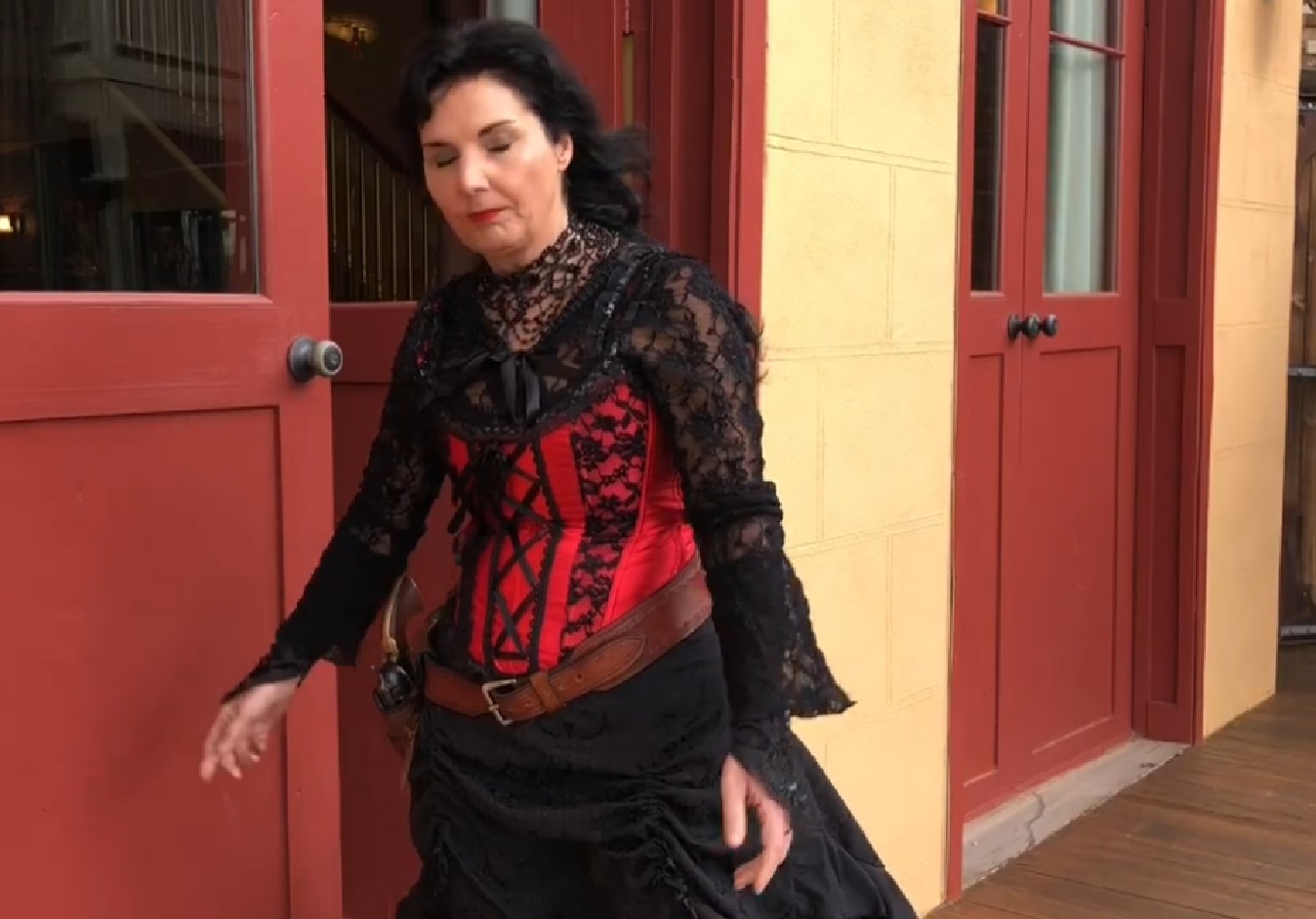Screenshot of Big Nose Kate (Kate Horony) walking outside - from One Day Only (2018/19)