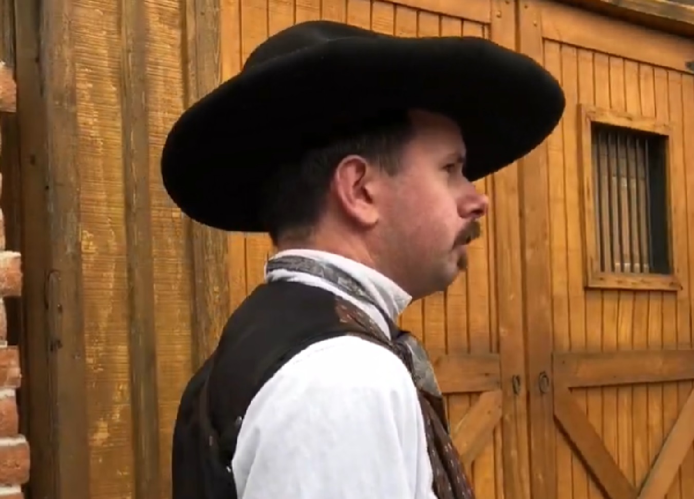 Screenshot of Doc Holliday walking ouside  - from One Day Only (2018/19)