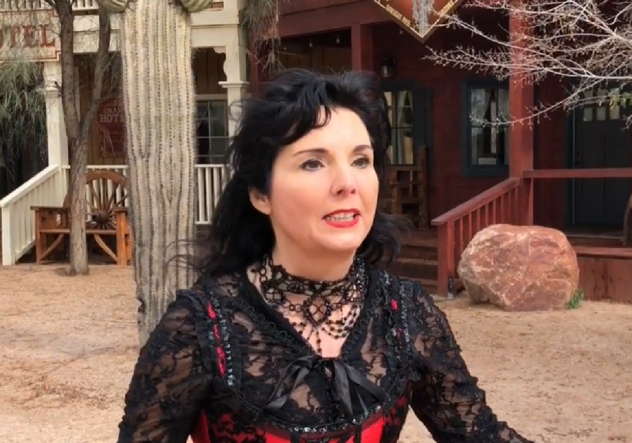 Screenshot of Big Nose Kate (Kate Horony) standing ouside - from One Day Only (2018/19)