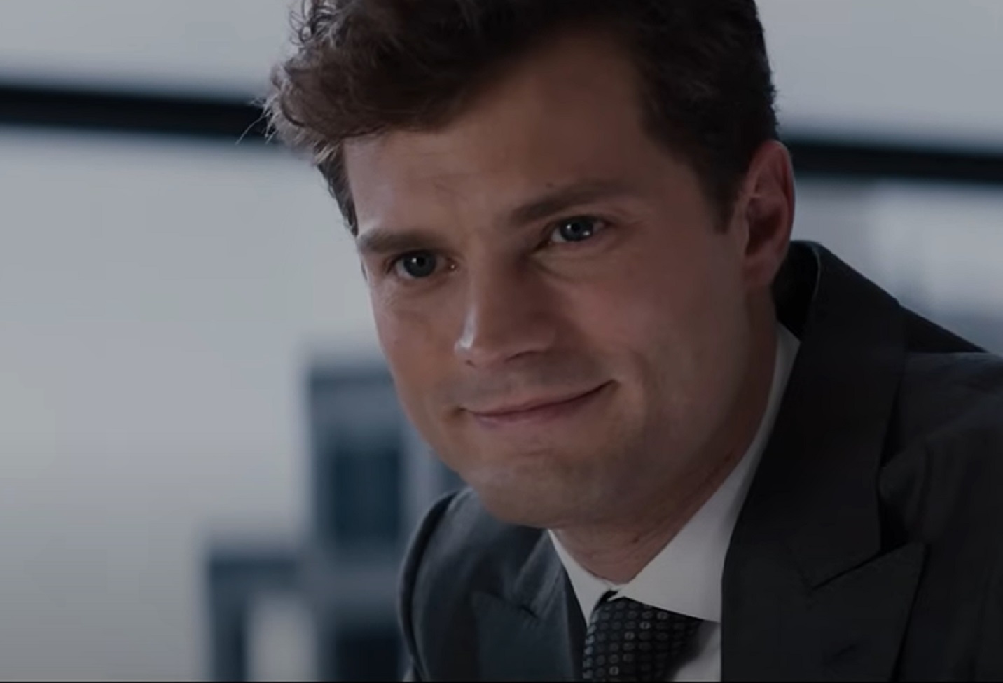 Screenshot of  Christian Grey looking at front - from Fifty Shades of Grey (2015)