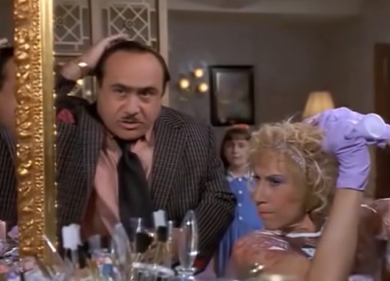 Screenshot of Matilda with her parents - from Matilda (1996)