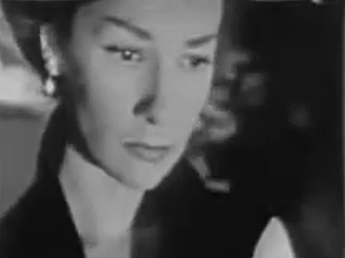 Screenshot of Felicia Montealegre looking upset - from Studio One - Flowers From A Stranger  (1949)