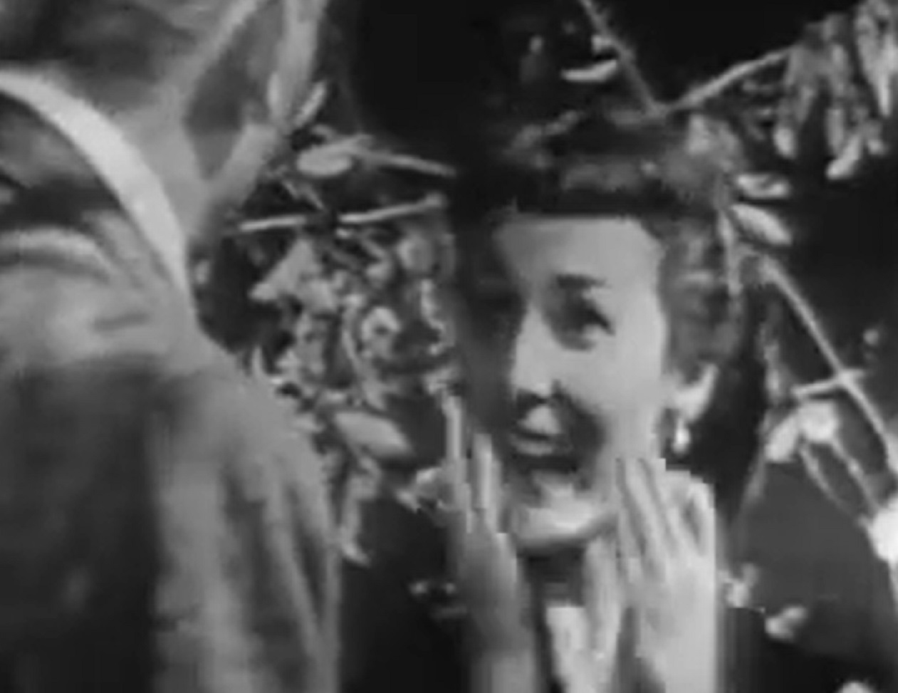 Screenshot of Felicia Montealegre looking happy - from Studio One - Flowers From A Stranger  (1949)