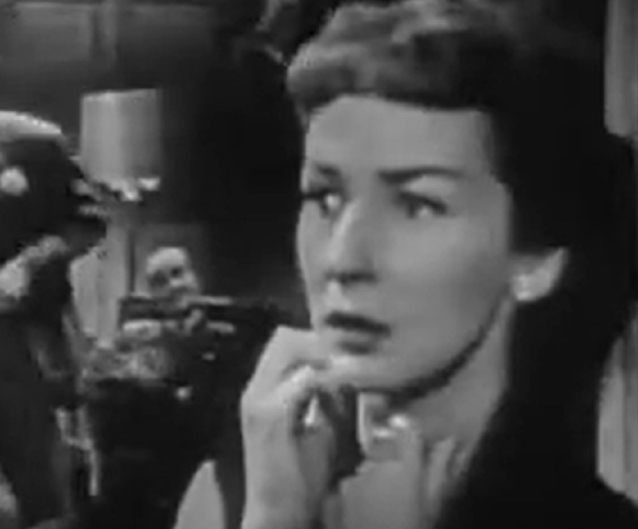 Screenshot of Felicia Montealegre looking shocked - from Studio One - Flowers From A Stranger  (1949)