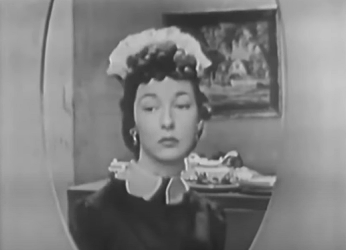 Screenshot of Felicia Montealegre looking sad down - from Studio One - Of Human Bondage  (1949)