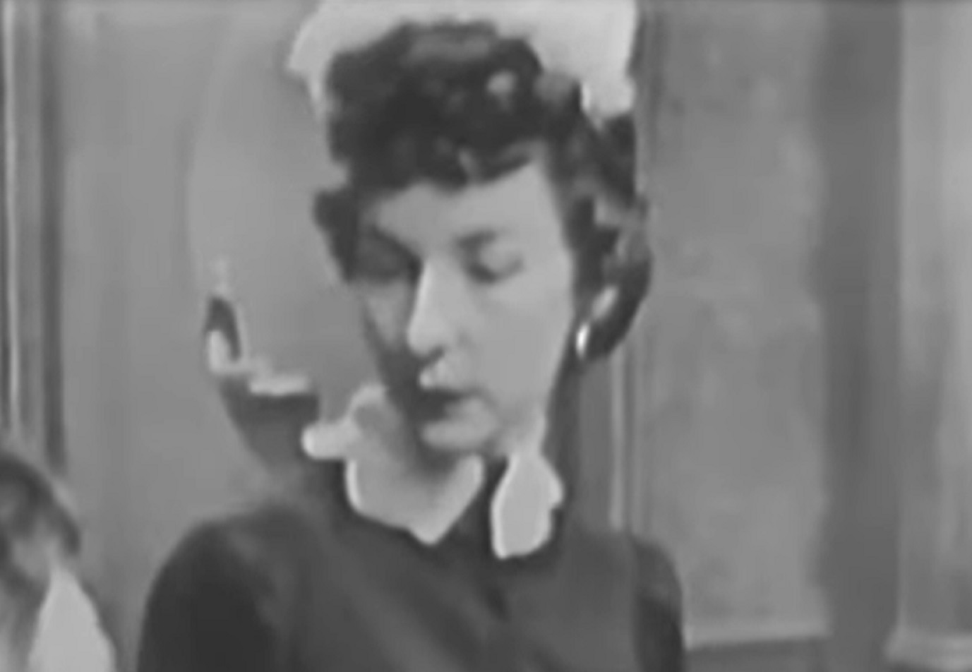 Screenshot of Felicia Montealegre looking at side - from Studio One - Of Human Bondage  (1949)