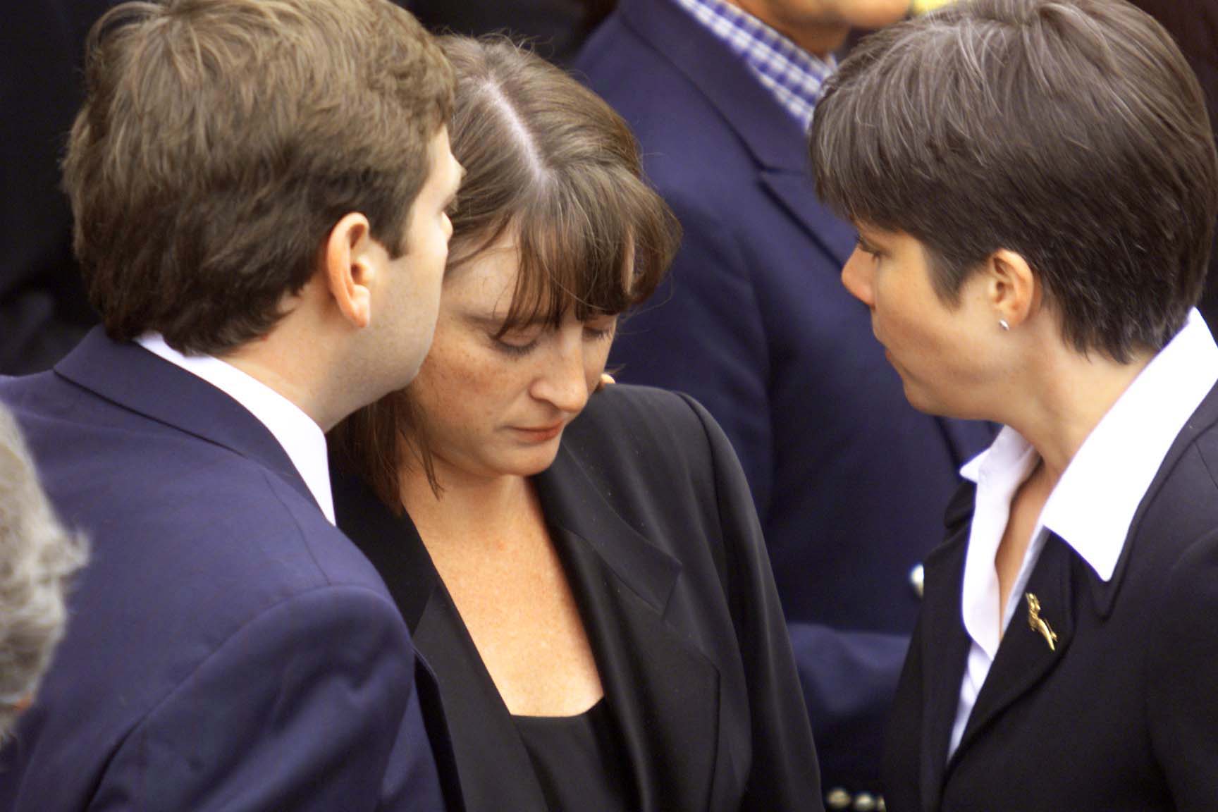Oliver Reed's family  at his funeral
