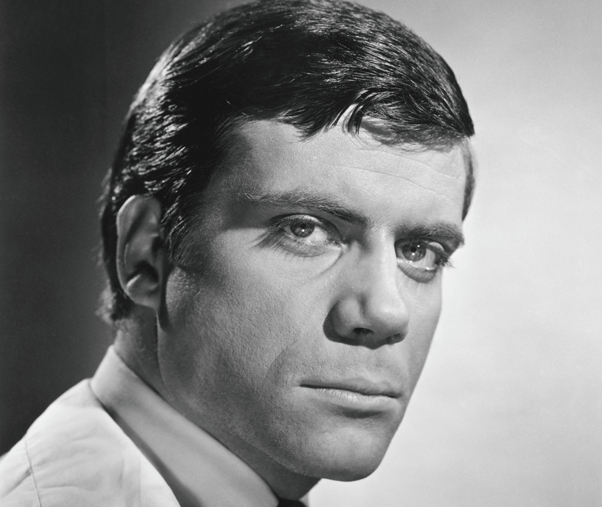Actor Oliver Reed in white shirt