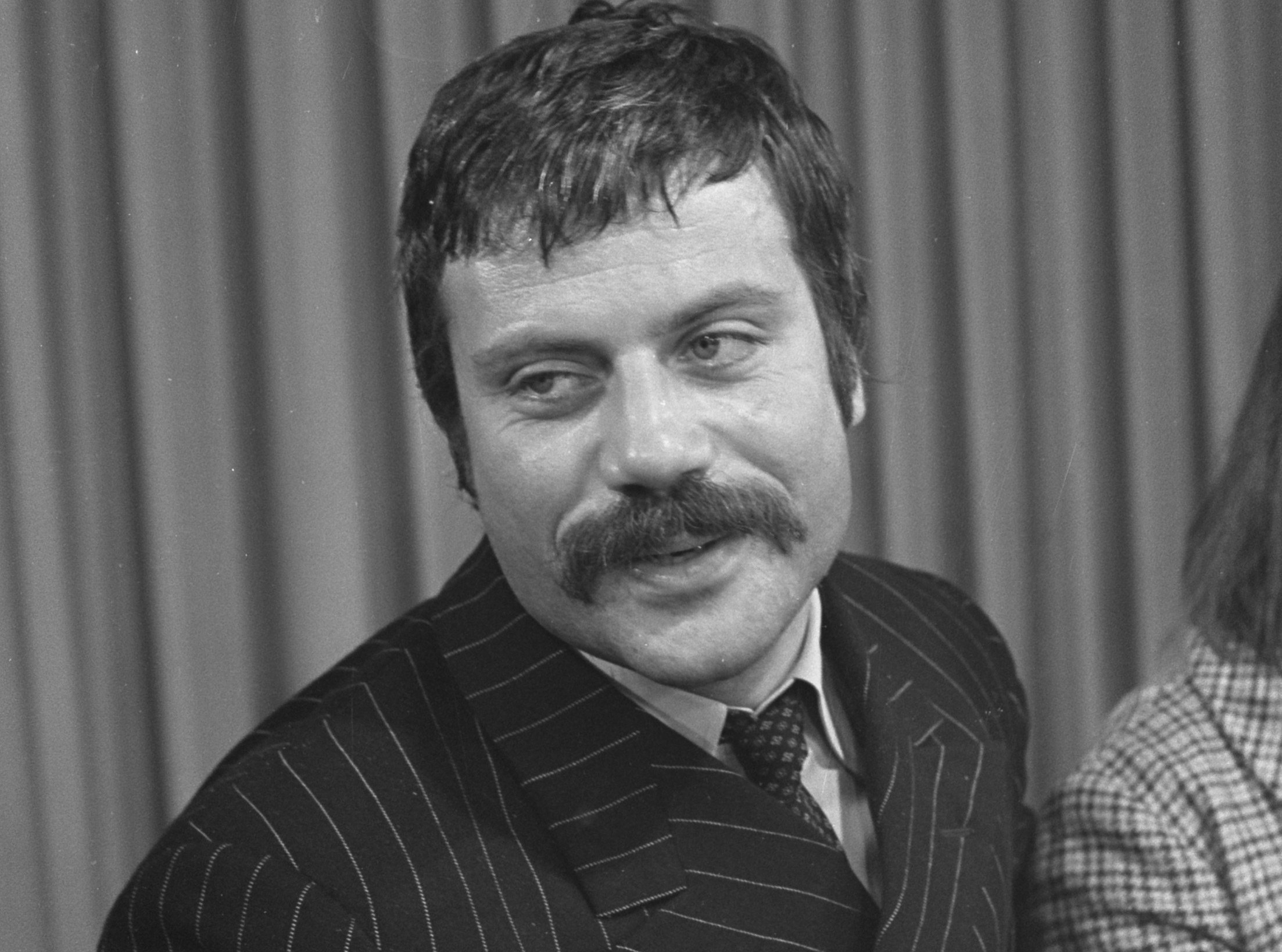 Oliver Reed 1968 in striped suit