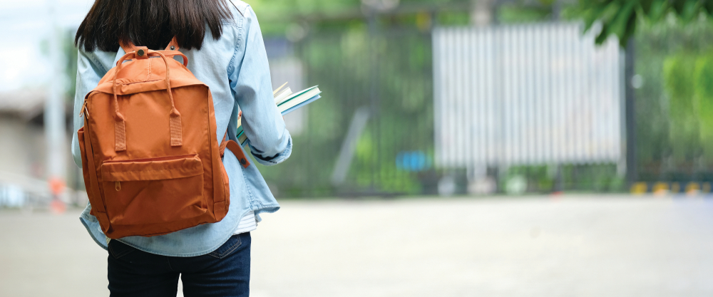 girl walking to school
