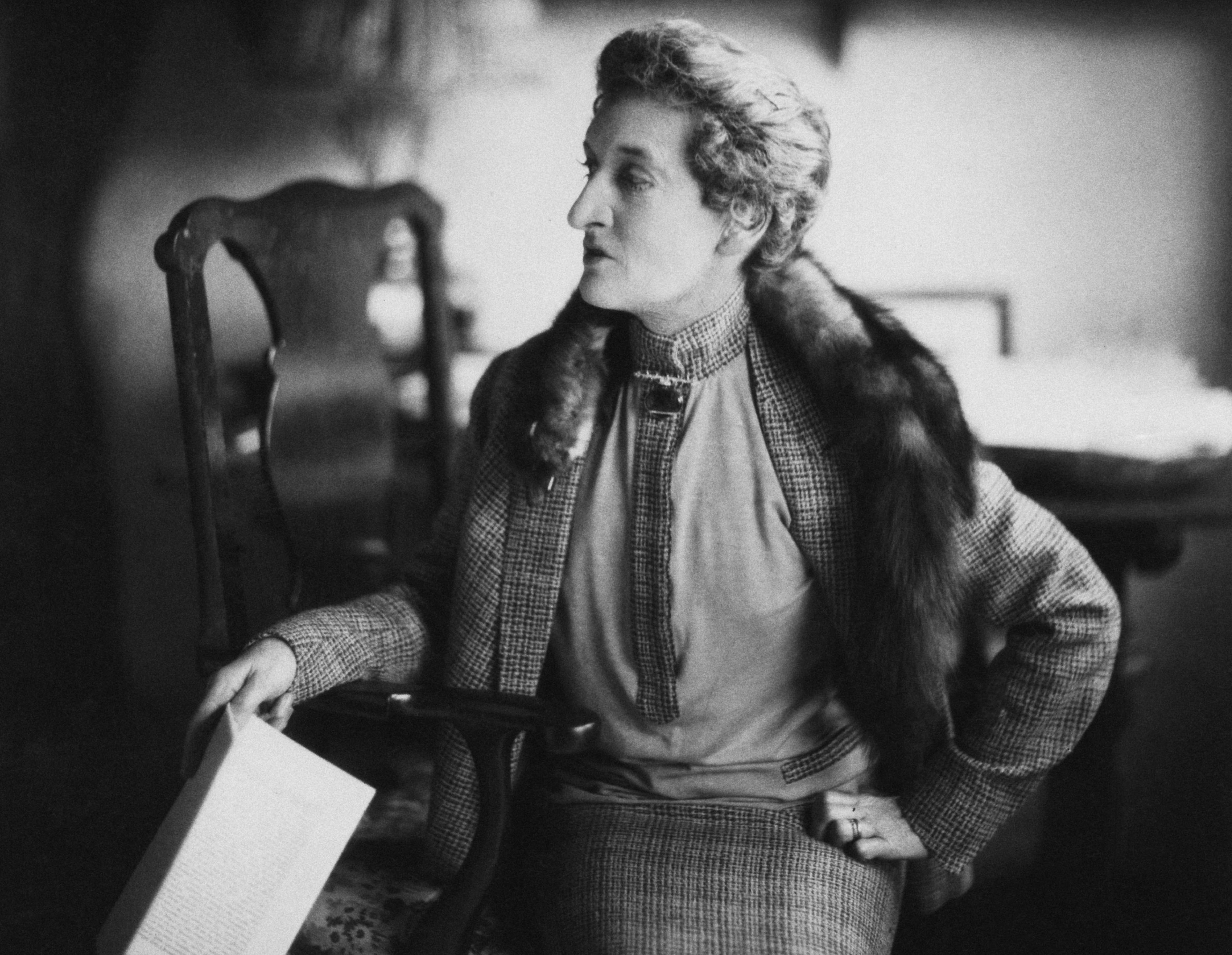 Margot Asquith in plaid clothes and fur