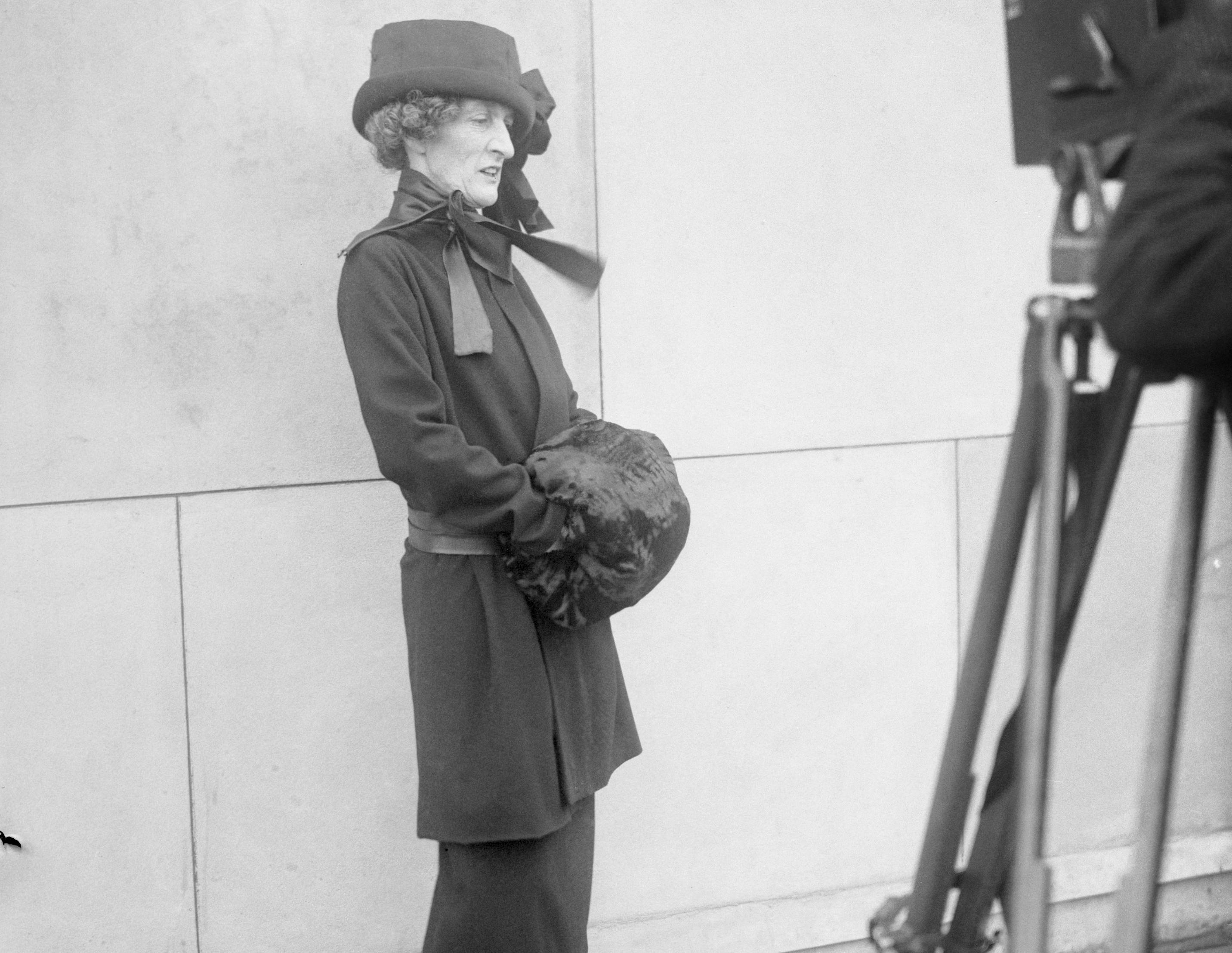 Portrait of Margot Asquith in black dress and a hat