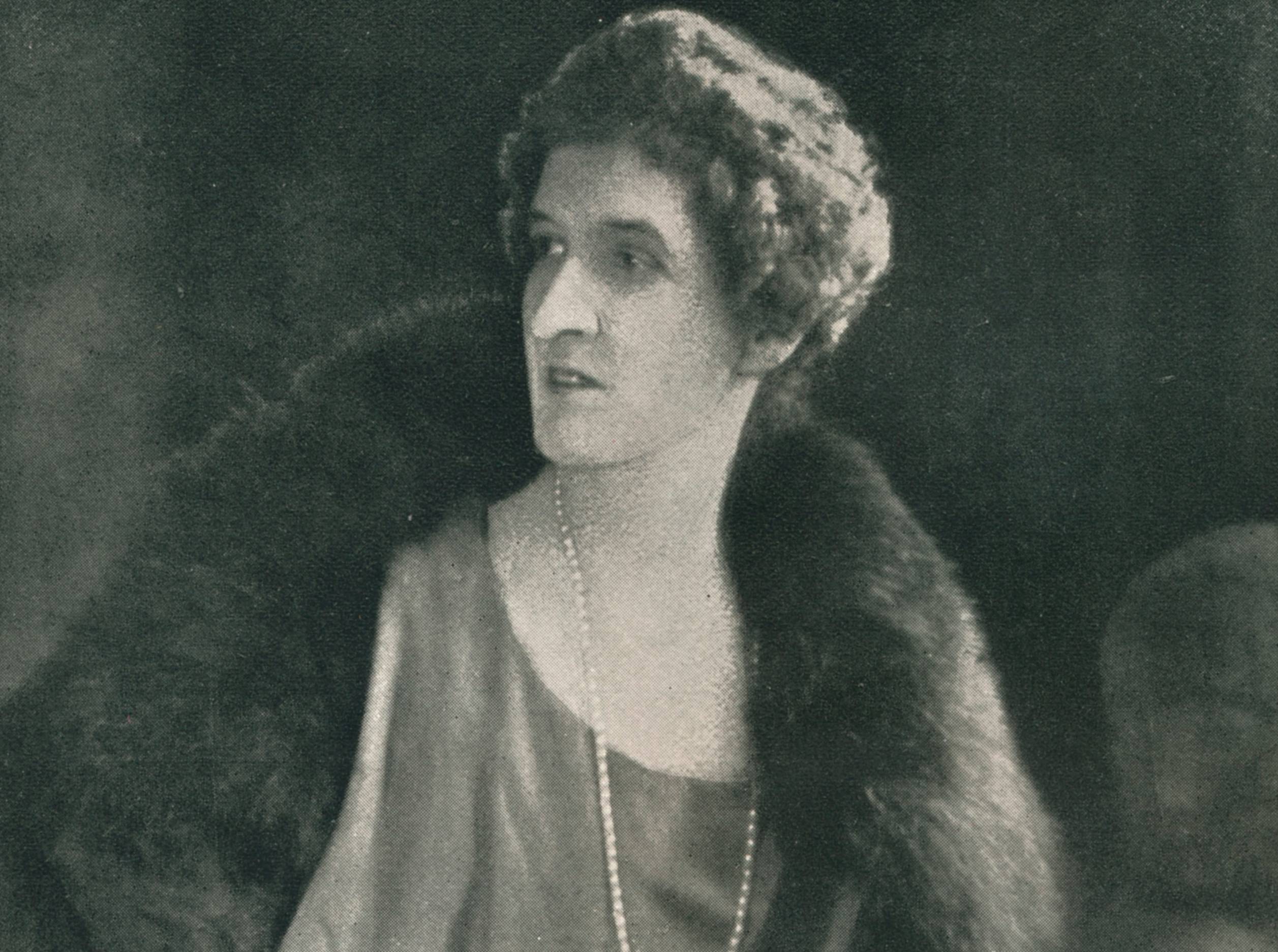 Margot Asquith in dress and a fur coat