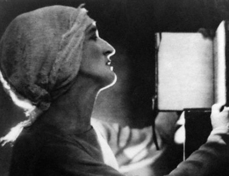 Margot Asquith reading a book