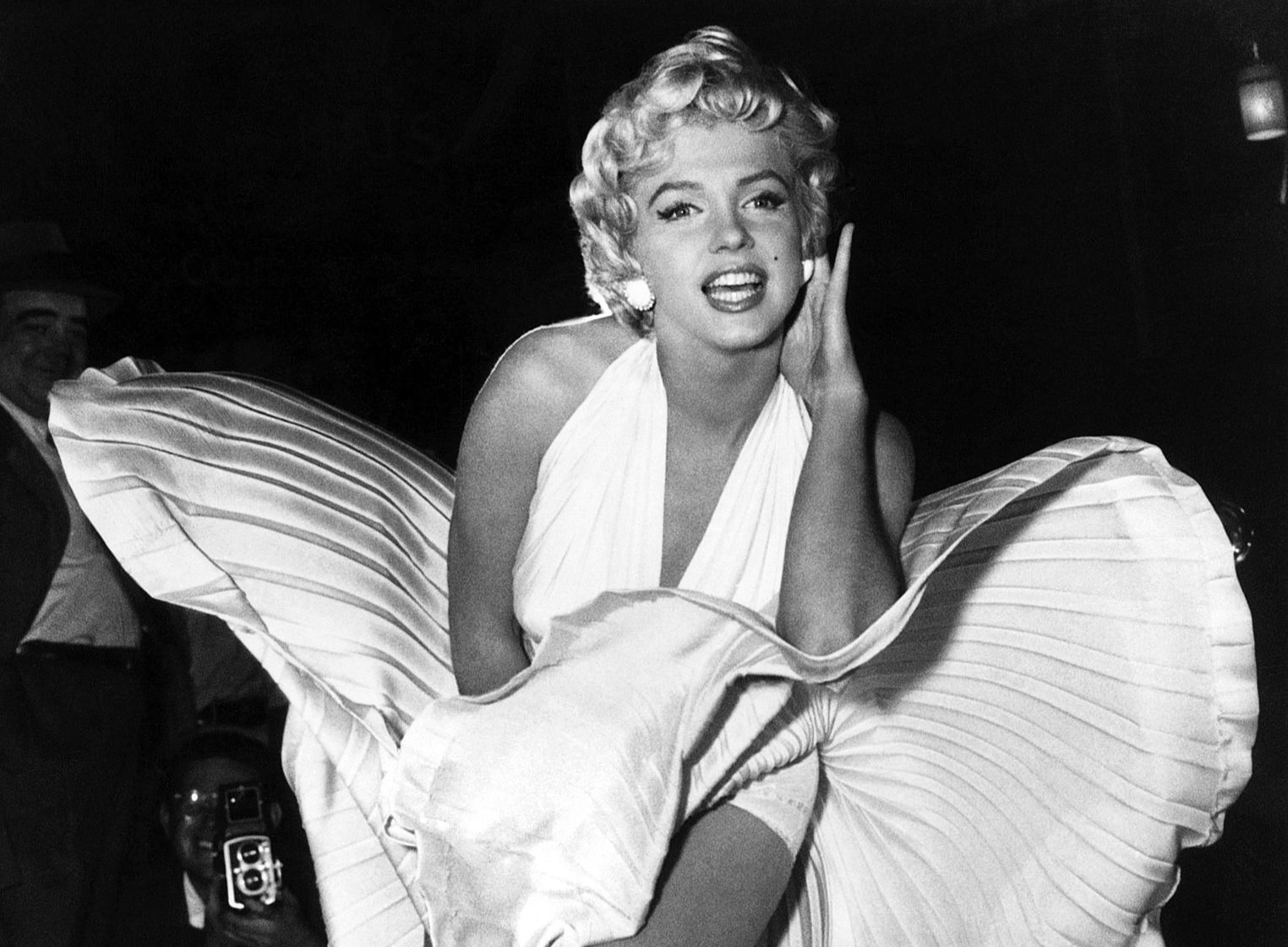 Photo of Marilyn Monroe while filming The Seven Year Itch on the streets of New York