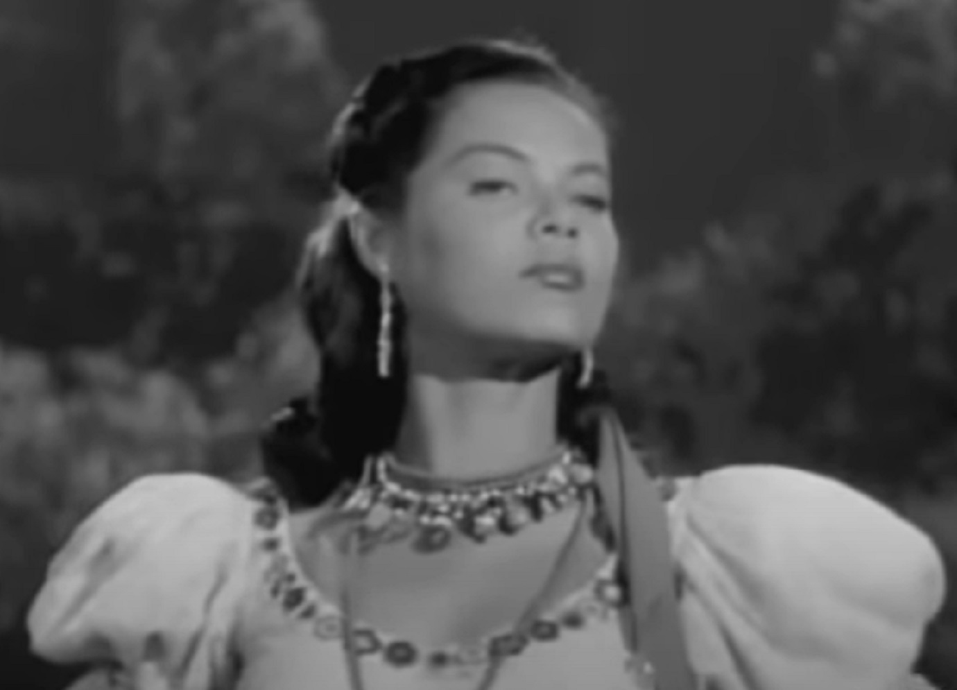 Screenshot of Dona Drake looking at side - from The Bandits of Corsica (1953)