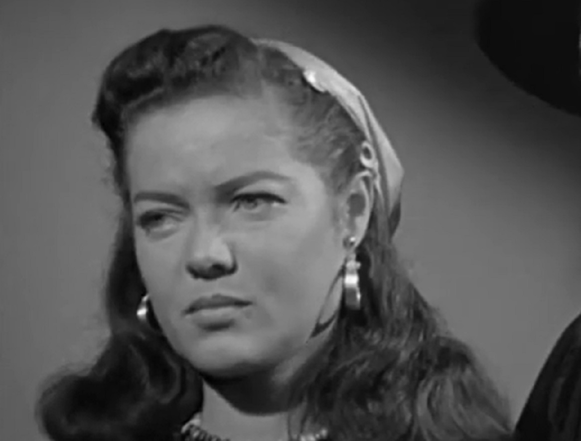Screenshot of Dona Drake looking sad at side - from The Bandits of Corsica (1953).