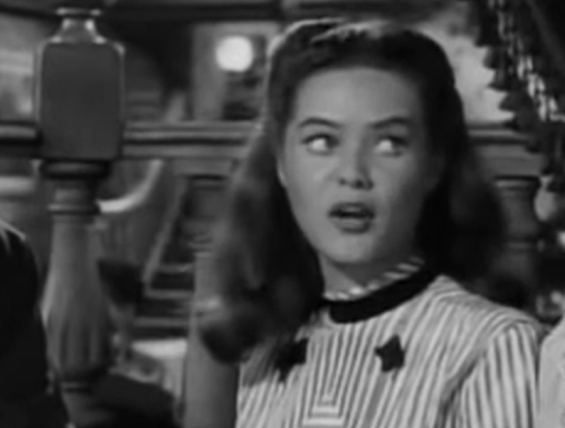 Screenshot of Dona Drake looking at side - from The Doolins of Oklahoma (1949)