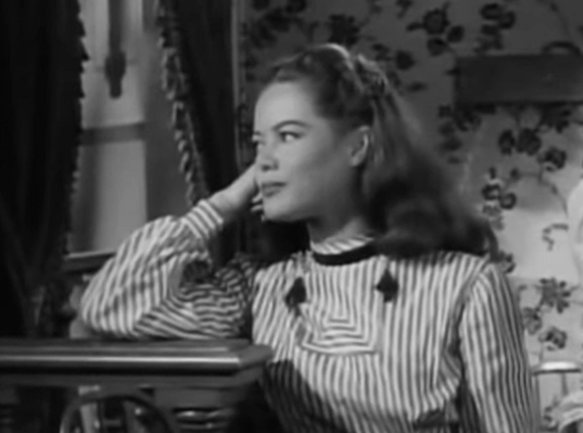 Screenshot of Dona Drake looking at side - from The Doolins of Oklahoma (1949)