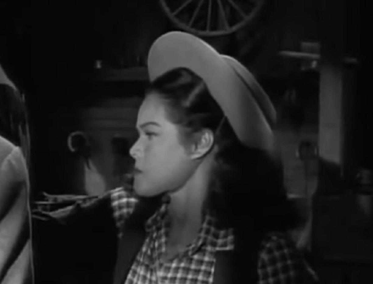 Screenshot of Dona Drake looking at side - from The Doolins of Oklahoma (1949)