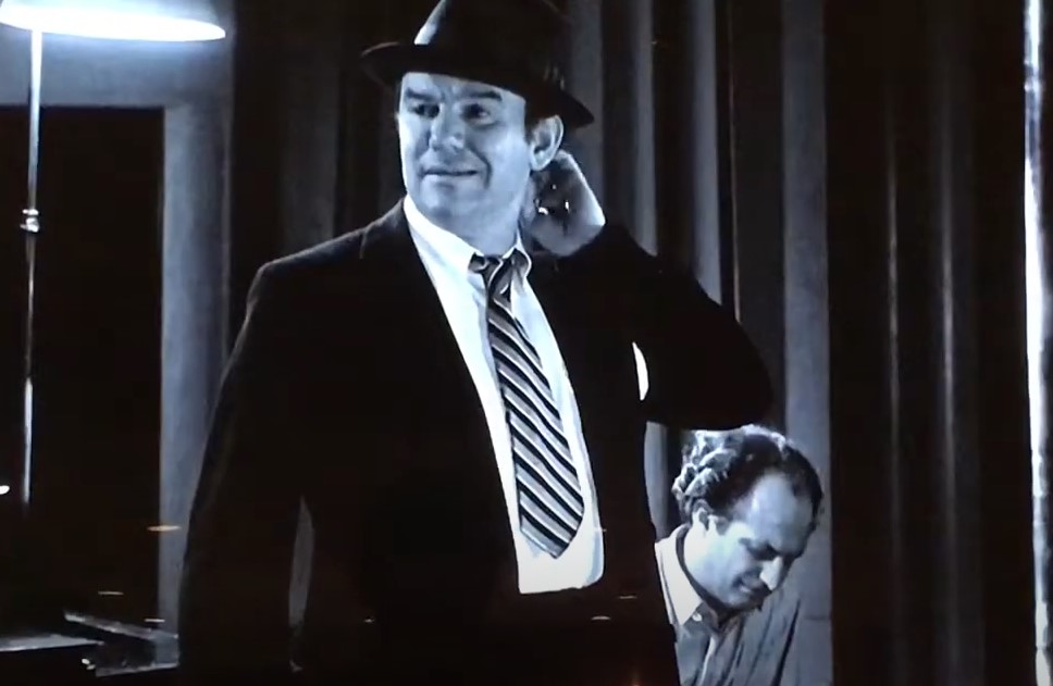 Ted Healy wearing suit and hat