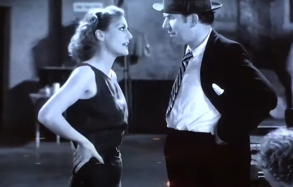 Ted Healy wearing suit and hat