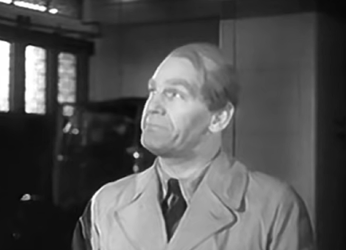Screenshot of Will Hay looking at side - from Where's That Fire? (1940)