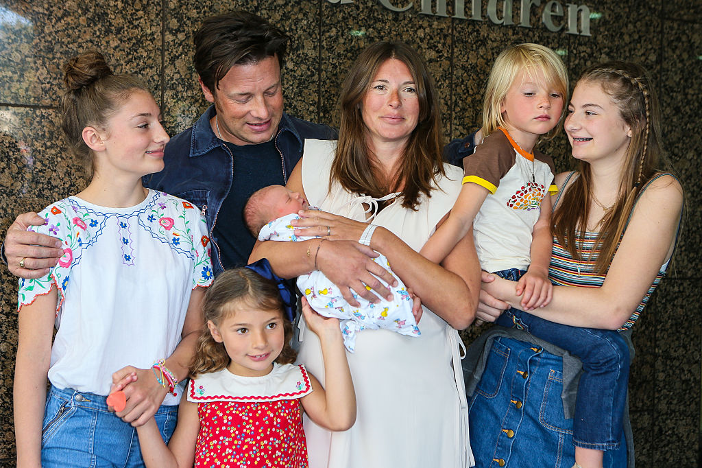 image of Jamie Oliver, Jools Oliver and family with their new baby