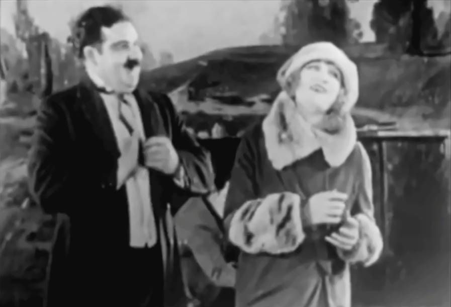 Oliver Hardy and Ethelyn Gibson in