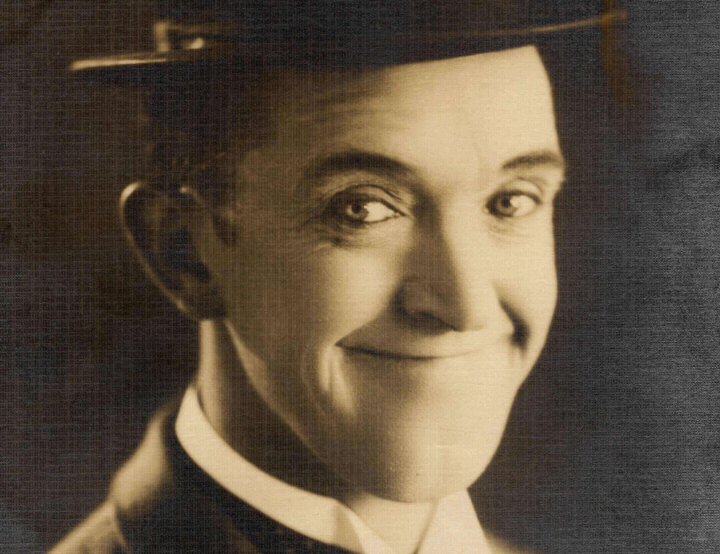 Stan Laurel in suit and a hat