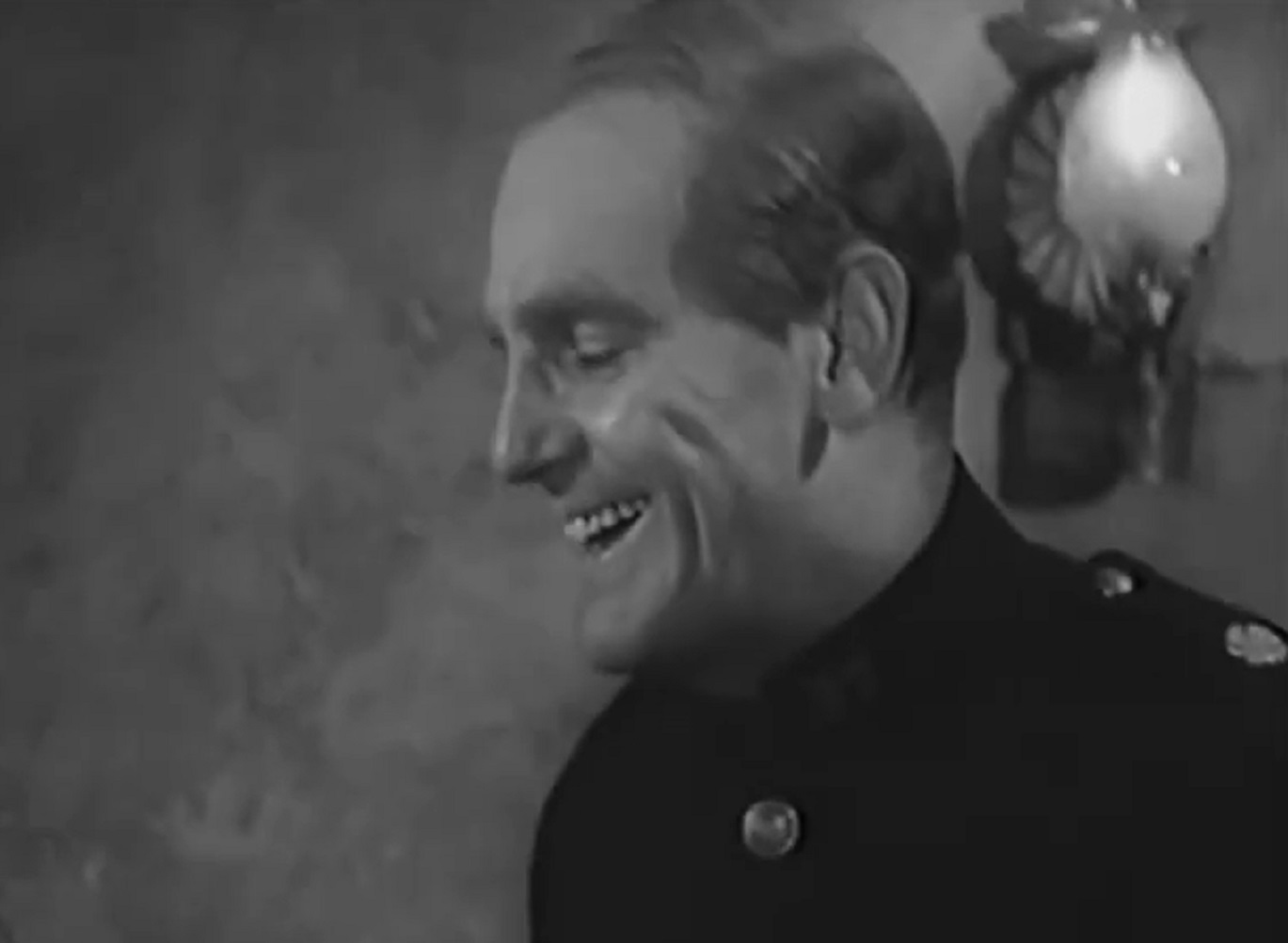 Screenshot of Will Hay laughing - from Ask a Policeman (1939)
