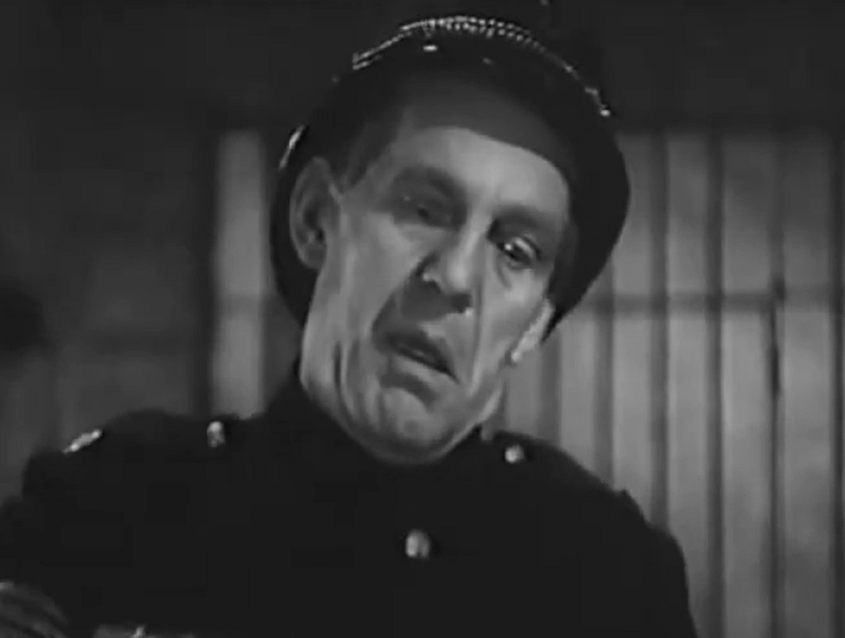 Screenshot of Will Hay looking upset - from Ask a Policeman (1939)