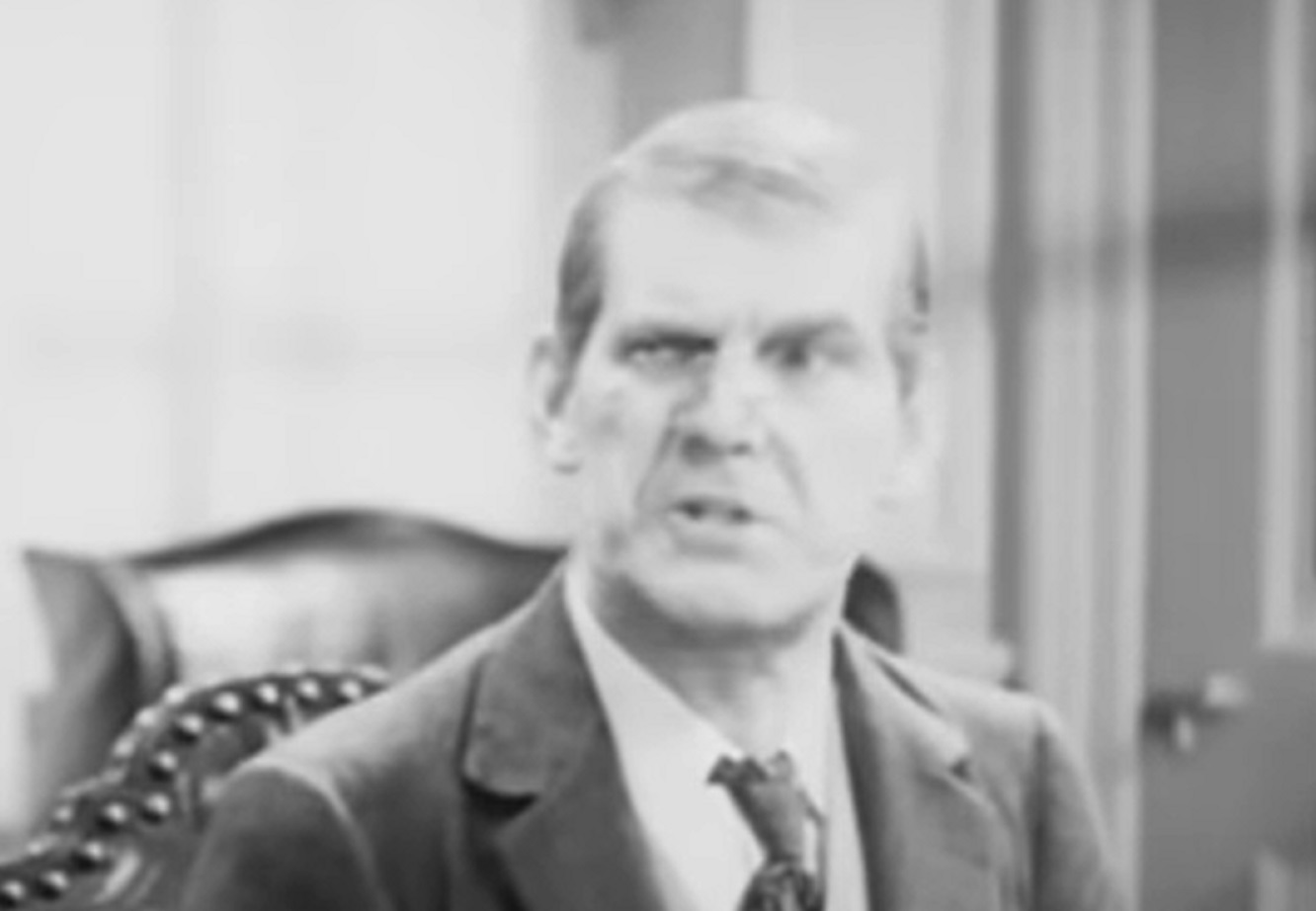 Screenshot of Will Hay looking at side- from Convict 99 (1938)