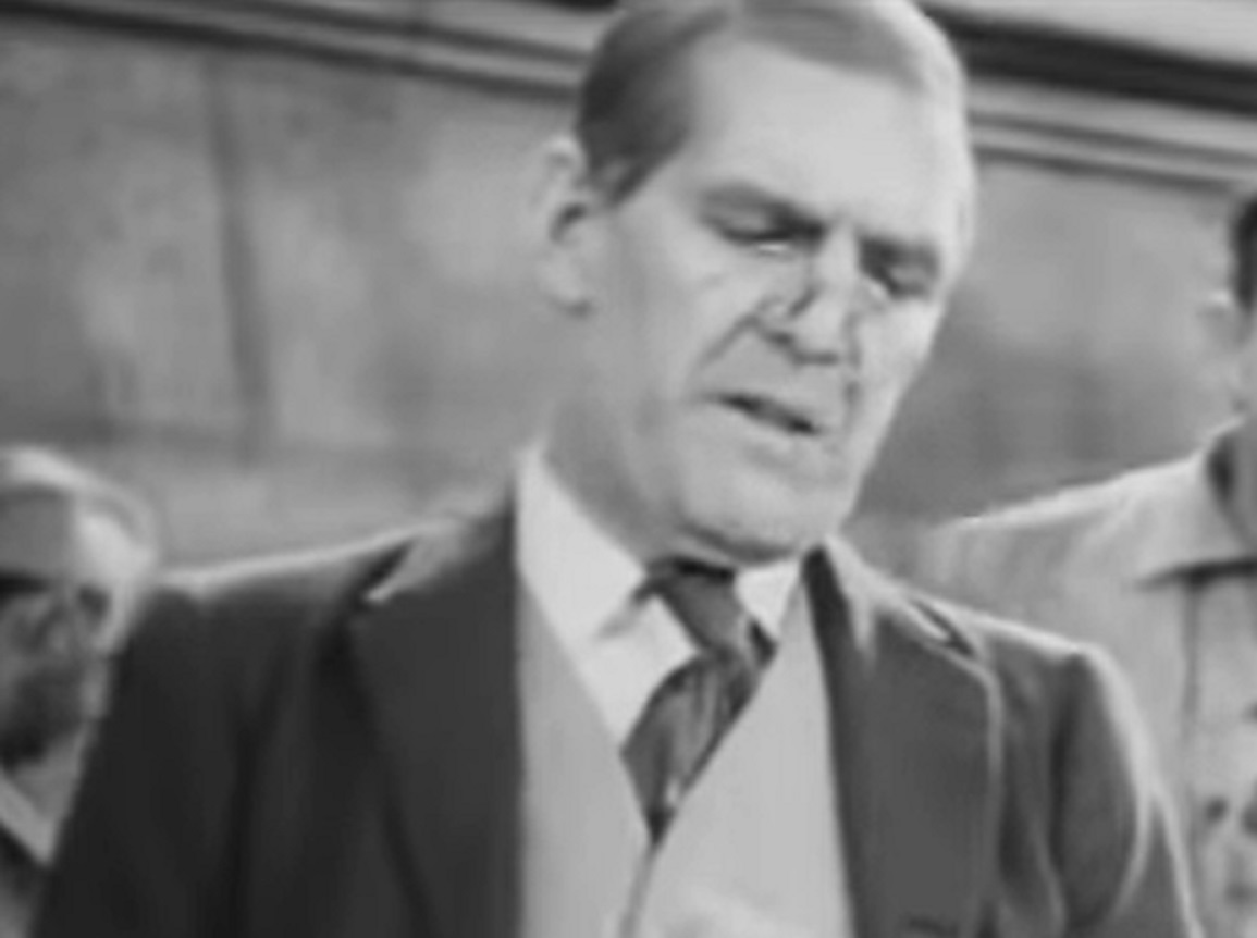 Screenshot of Will Hay looking down - from Convict 99 (1938)