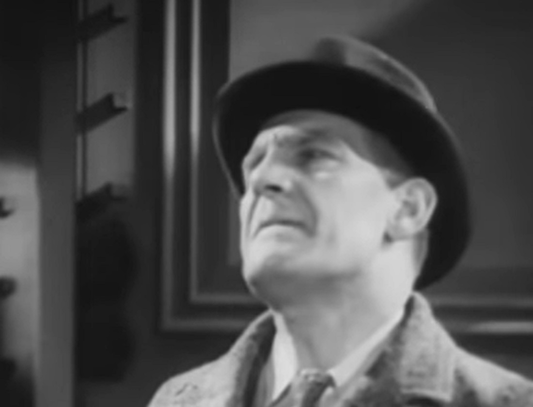 Screenshot of Will Hay looking at side upset - from Convict 99 (1938)