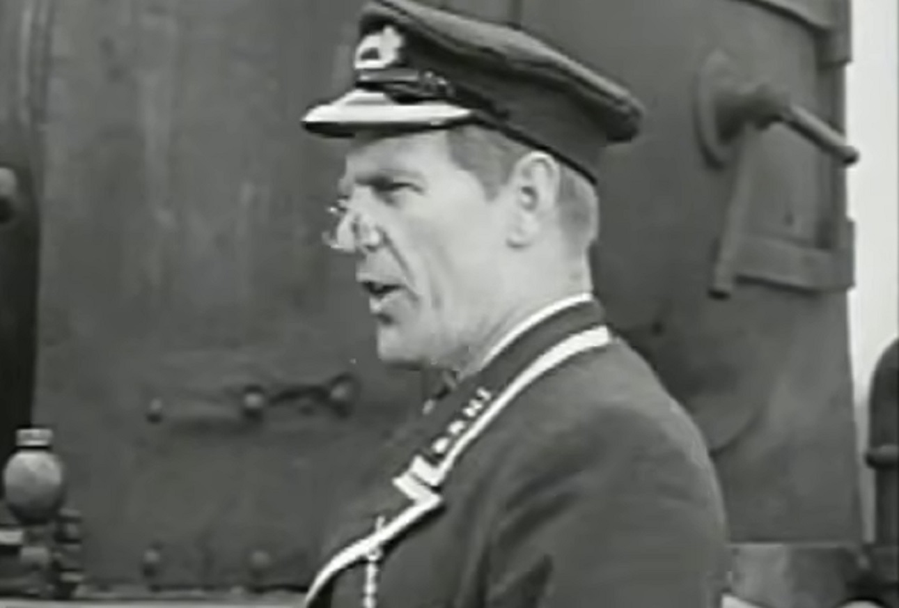 Screenshot of Will Hay looking at side and talking - from Oh, Mr Porter! (1937)