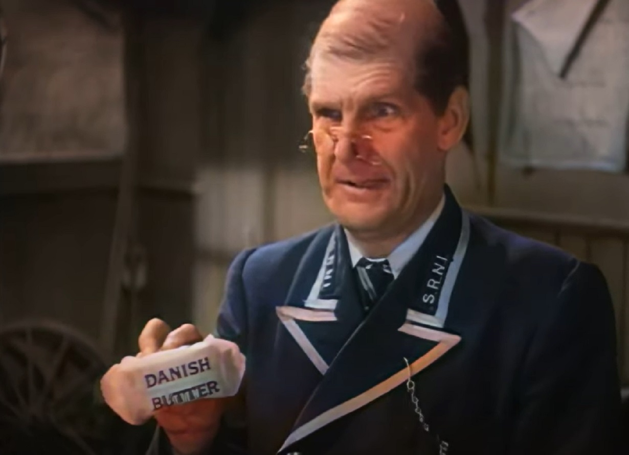Screenshot of Will Hay wearing uniform and looking surprised - from Oh, Mr Porter! (1937)
