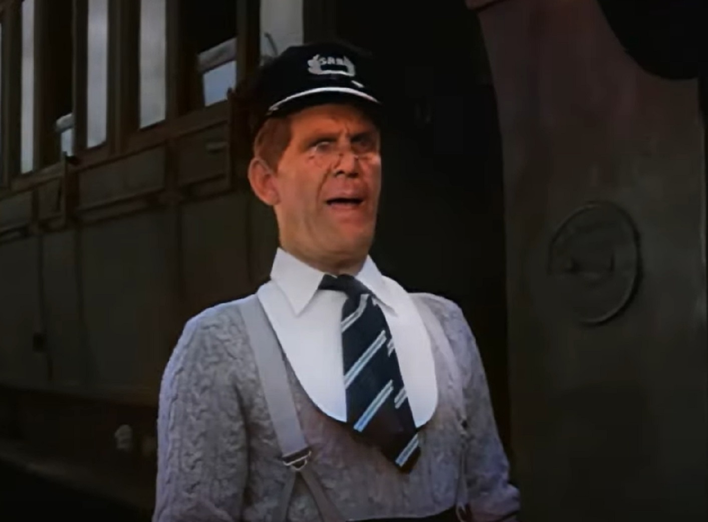 Screenshot of Will Hay looking at side and talking - from Oh, Mr Porter! (1937)